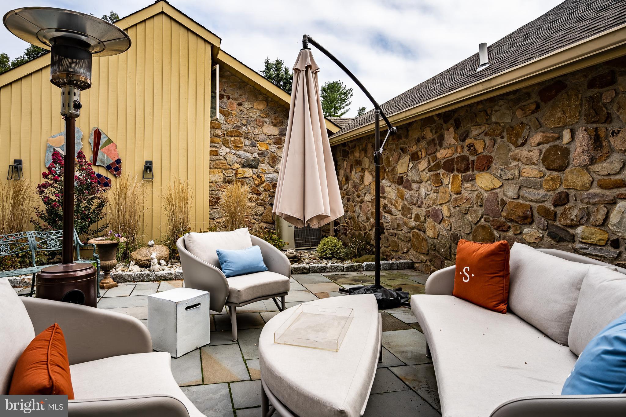 1256 Round Hill Road Bryn Mawr, PA 19010 - Photo 4 of 65 a outdoor living room with furniture
