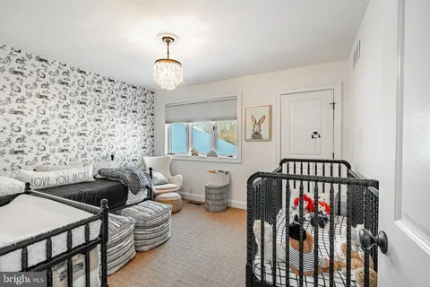 a view of a balcony dining table and chairs