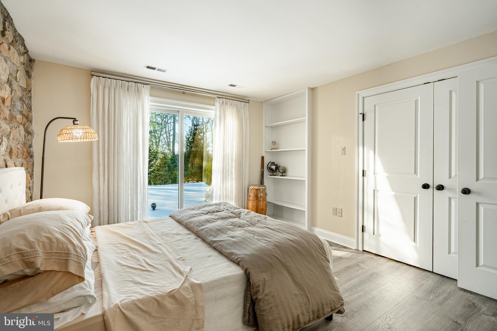 1256 Round Hill Road Bryn Mawr, PA 19010 - Photo 48 of 65 a bedroom with a bed and a window