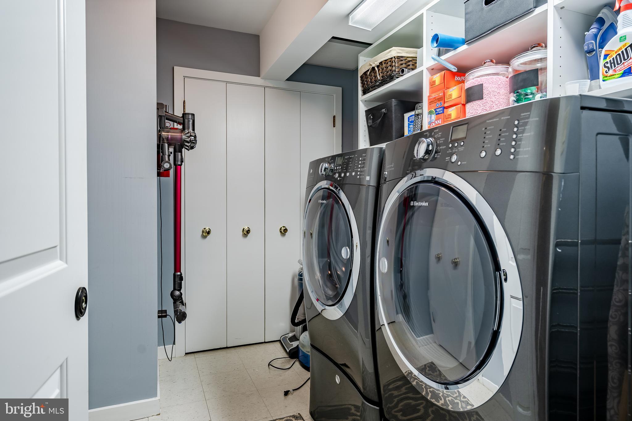1256 Round Hill Road Bryn Mawr, PA 19010 - Photo 50 of 65 a utility room with dryer and washer