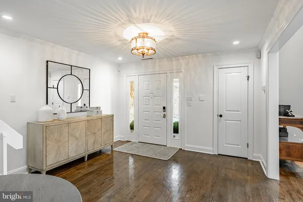 a room with furniture and a wooden floor