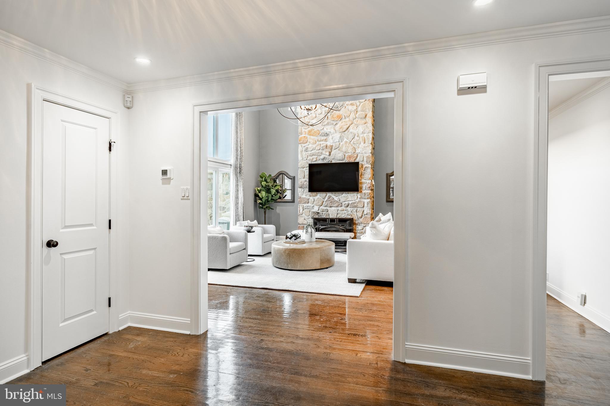 1256 Round Hill Road Bryn Mawr, PA 19010 - Photo 8 of 65 a room with furniture and a wooden floor
