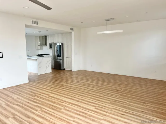 a view of a kitchen with a sink