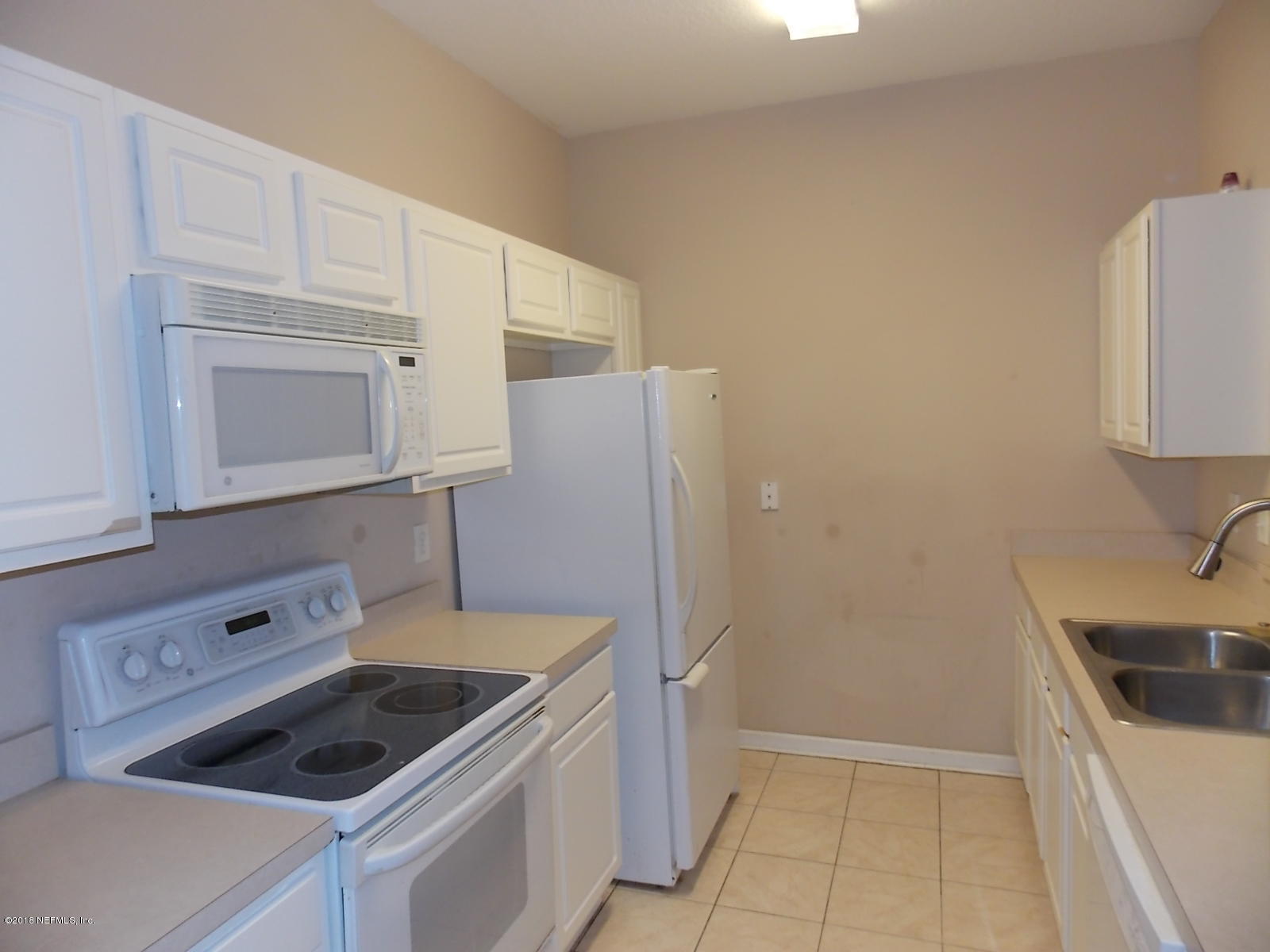10550 Baymeadows Road, Unit 125 Jacksonville, FL 32256 - Photo 4 of 22 Kitchen with Tile Flooring