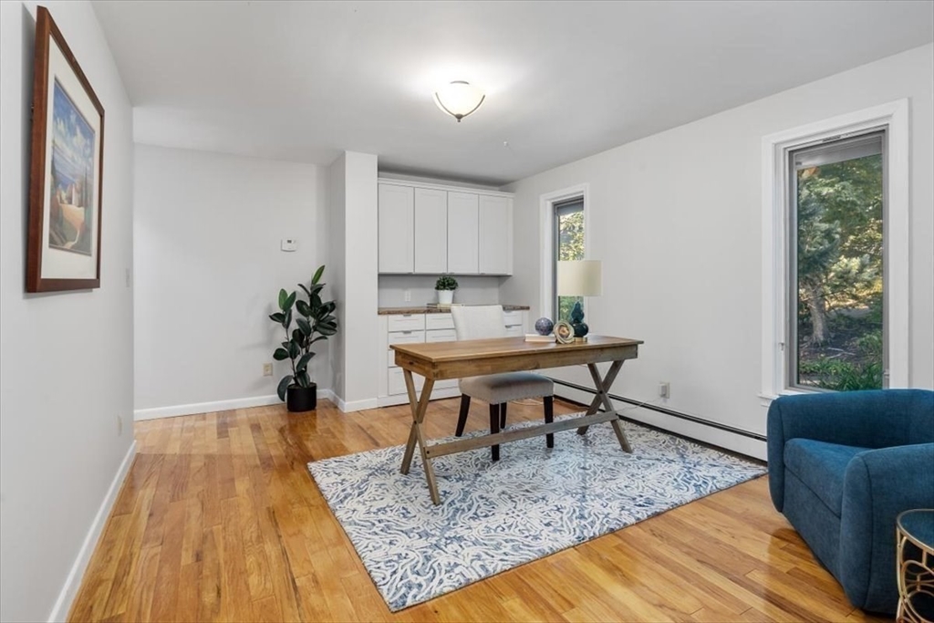 6 Grist Mill Lane Hingham, MA 02043 - Photo 8 of 17 a workspace room with furniture and wooden floor