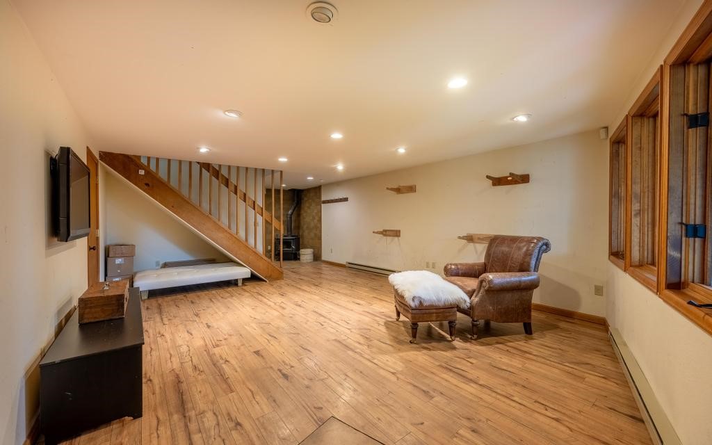 326 Spring Beauty Drive Silverthorne, CO 80498 - Photo 20 of 33 a living room with furniture and a wooden floor