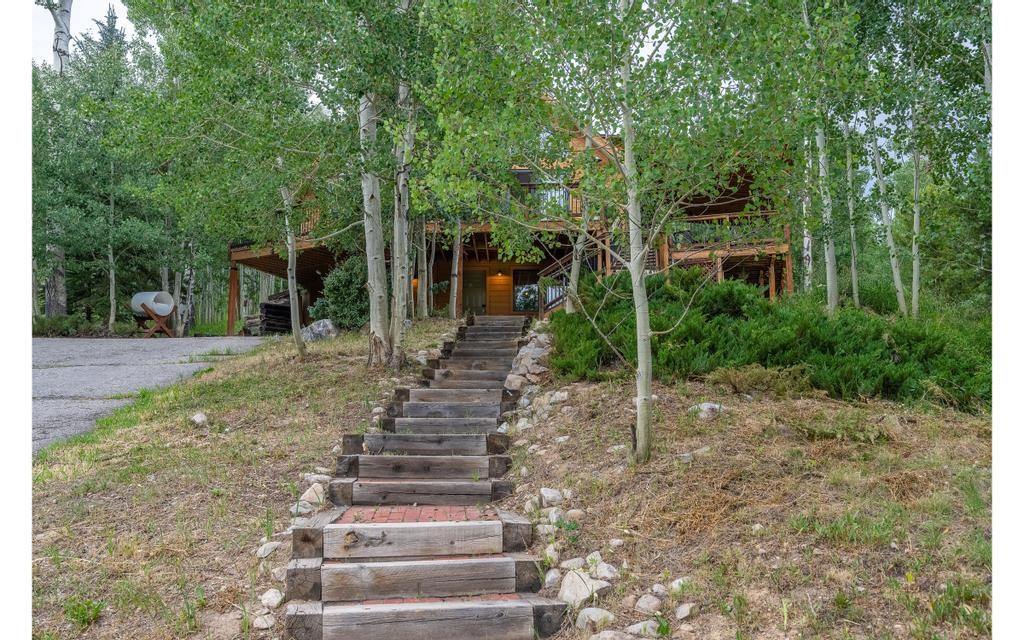 326 Spring Beauty Drive Silverthorne, CO 80498 - Photo 32 of 33 a view of a house with backyard