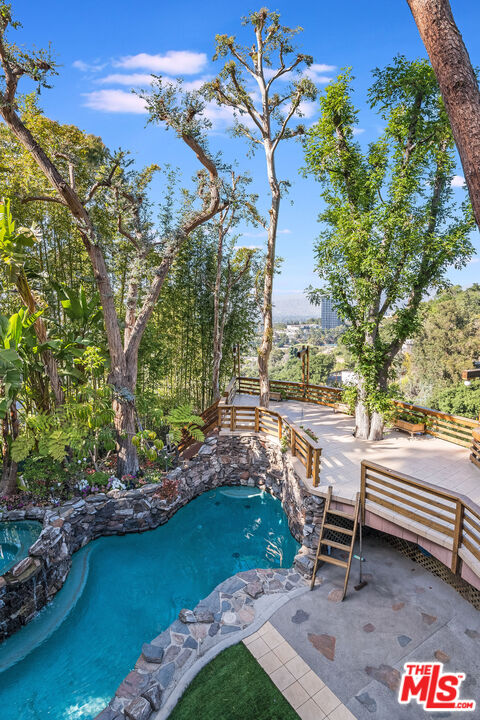 3572 Multiview Drive Los Angeles, CA 90068 - Photo 14 of 51 a view of a bench in a garden