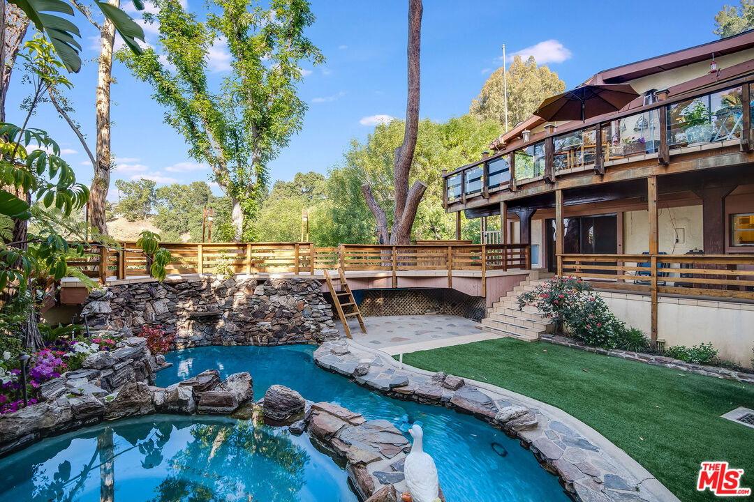 3572 Multiview Drive Los Angeles, CA 90068 - Photo 26 of 51 a view of a house with backyard and sitting area