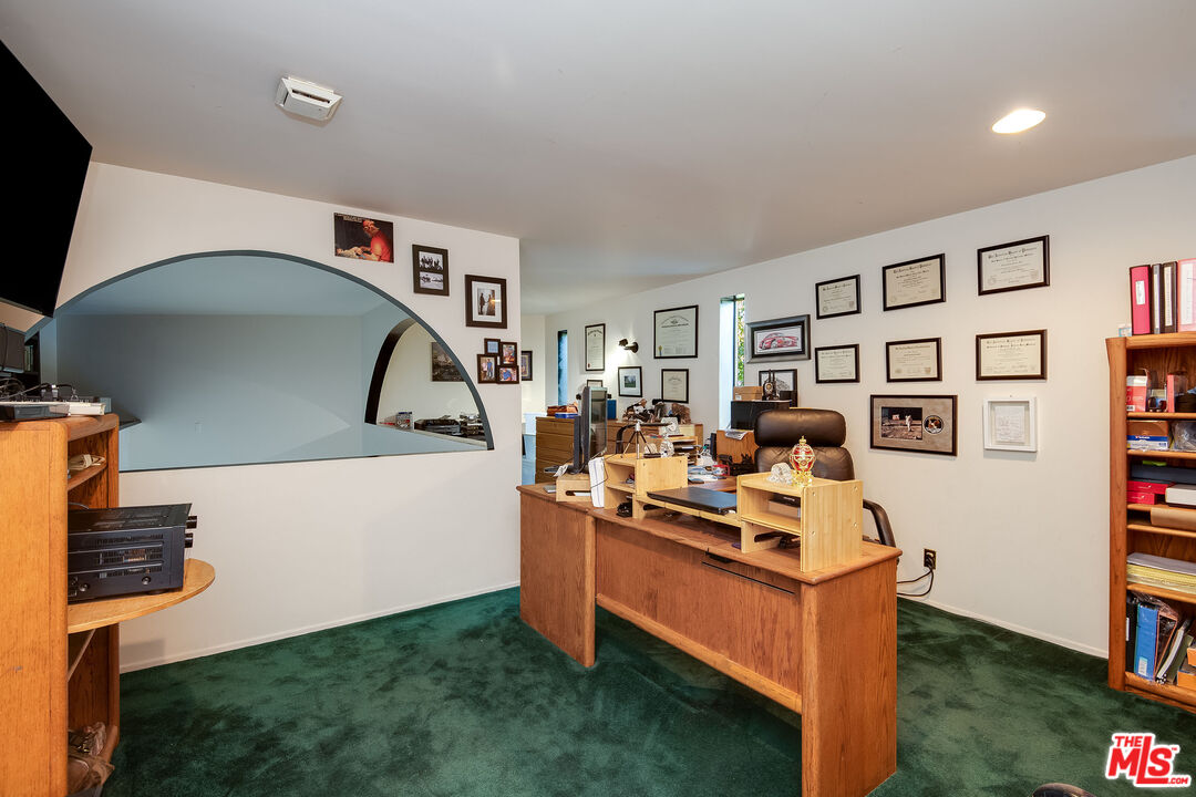 3572 Multiview Drive Los Angeles, CA 90068 - Photo 36 of 51 a room with furniture and a flat screen tv