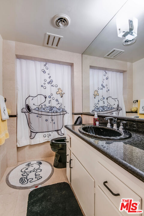 3572 Multiview Drive Los Angeles, CA 90068 - Photo 49 of 51 a kitchen with a sink and cabinets