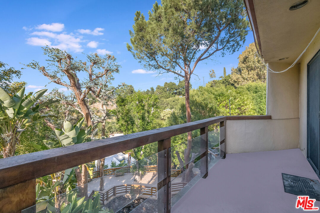 3572 Multiview Drive Los Angeles, CA 90068 - Photo 50 of 51 a view of a balcony with wooden fence