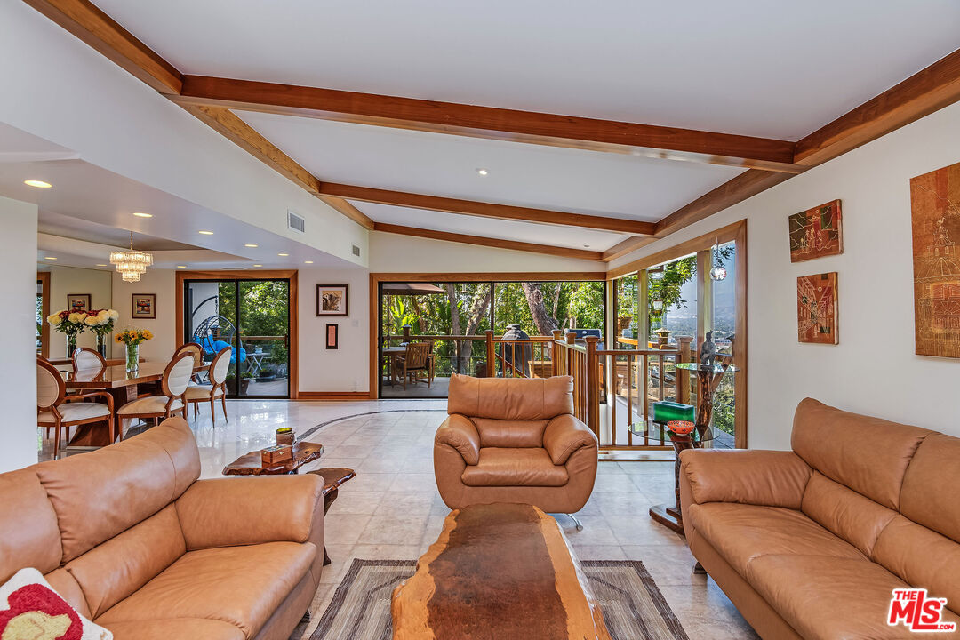 3572 Multiview Drive Los Angeles, CA 90068 - Photo 8 of 51 a living room with furniture and a large window