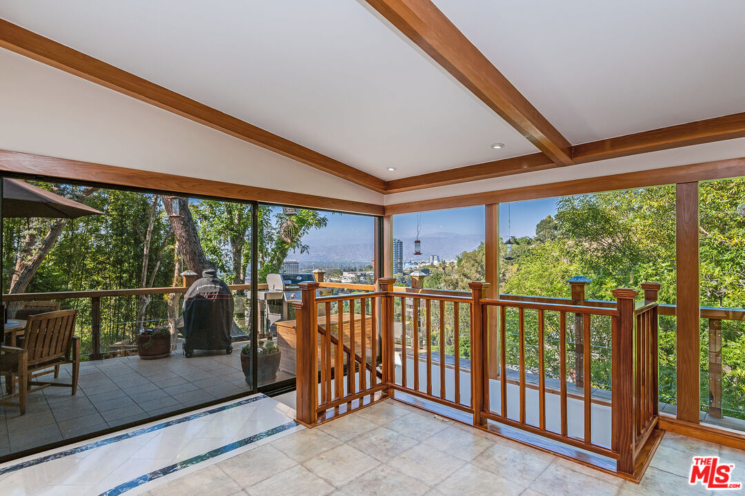 3572 Multiview Drive Los Angeles, CA 90068 - Photo 9 of 51 a view of a city from a balcony