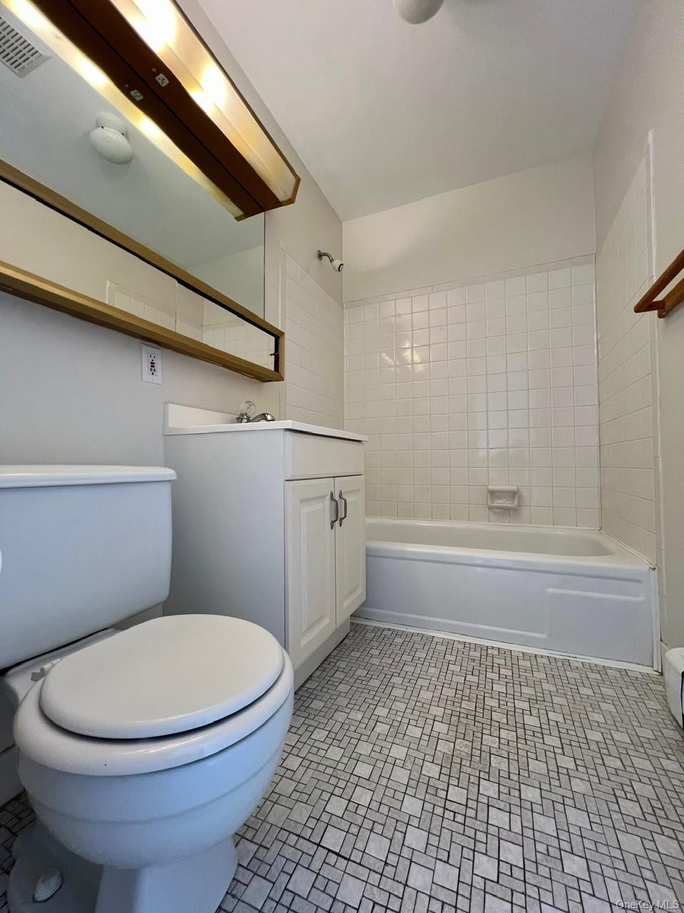9 Loudon Drive, Unit 6 Fishkill, NY 12524 - Photo 12 of 16 a bathroom with a toilet and a shower