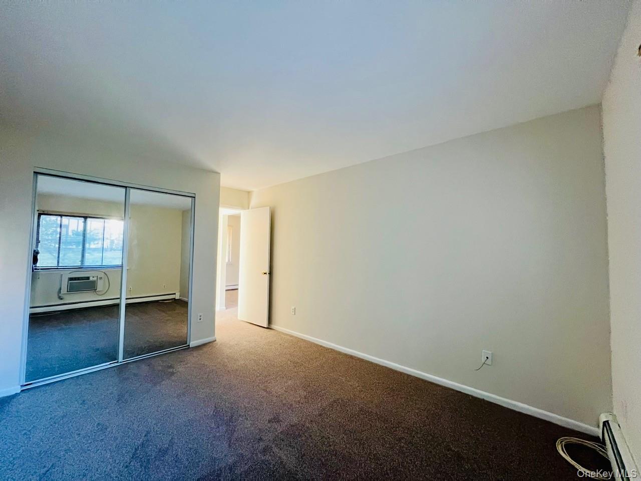 9 Loudon Drive, Unit 6 Fishkill, NY 12524 - Photo 10 of 16 an empty room with a window