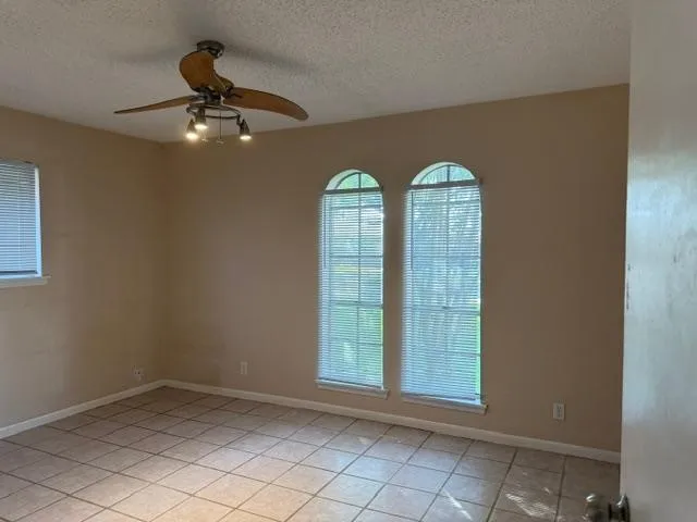 en empty room with windows