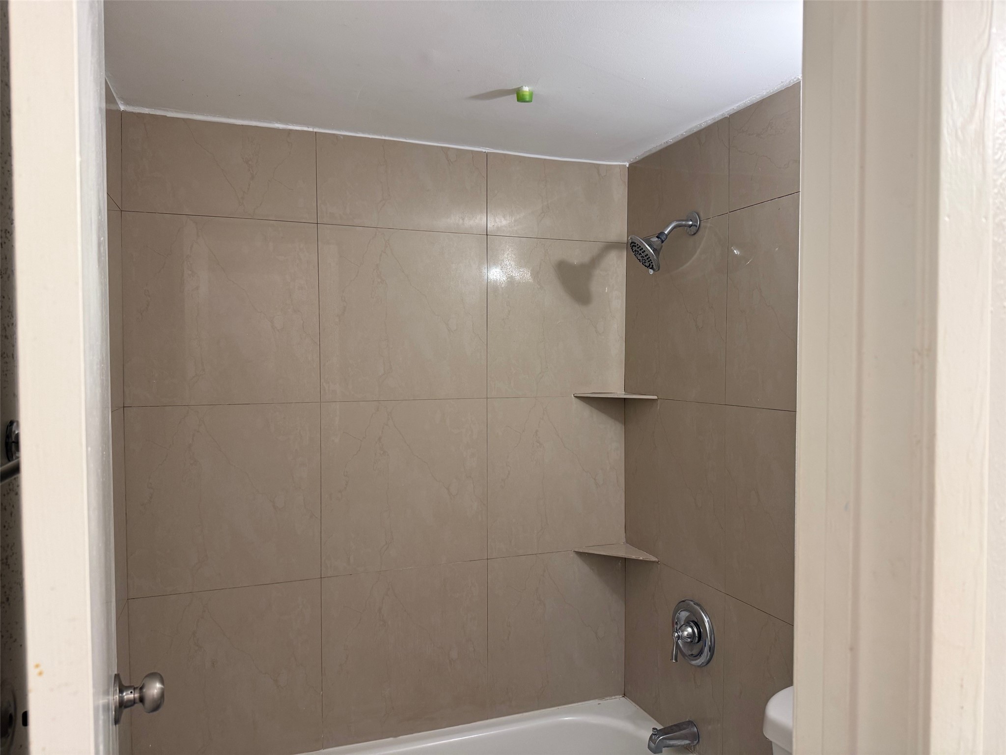 6701 Sands Point Drive, Unit 48 Houston, TX 77074 - Photo 21 of 30 a bathroom with a shower and toilet