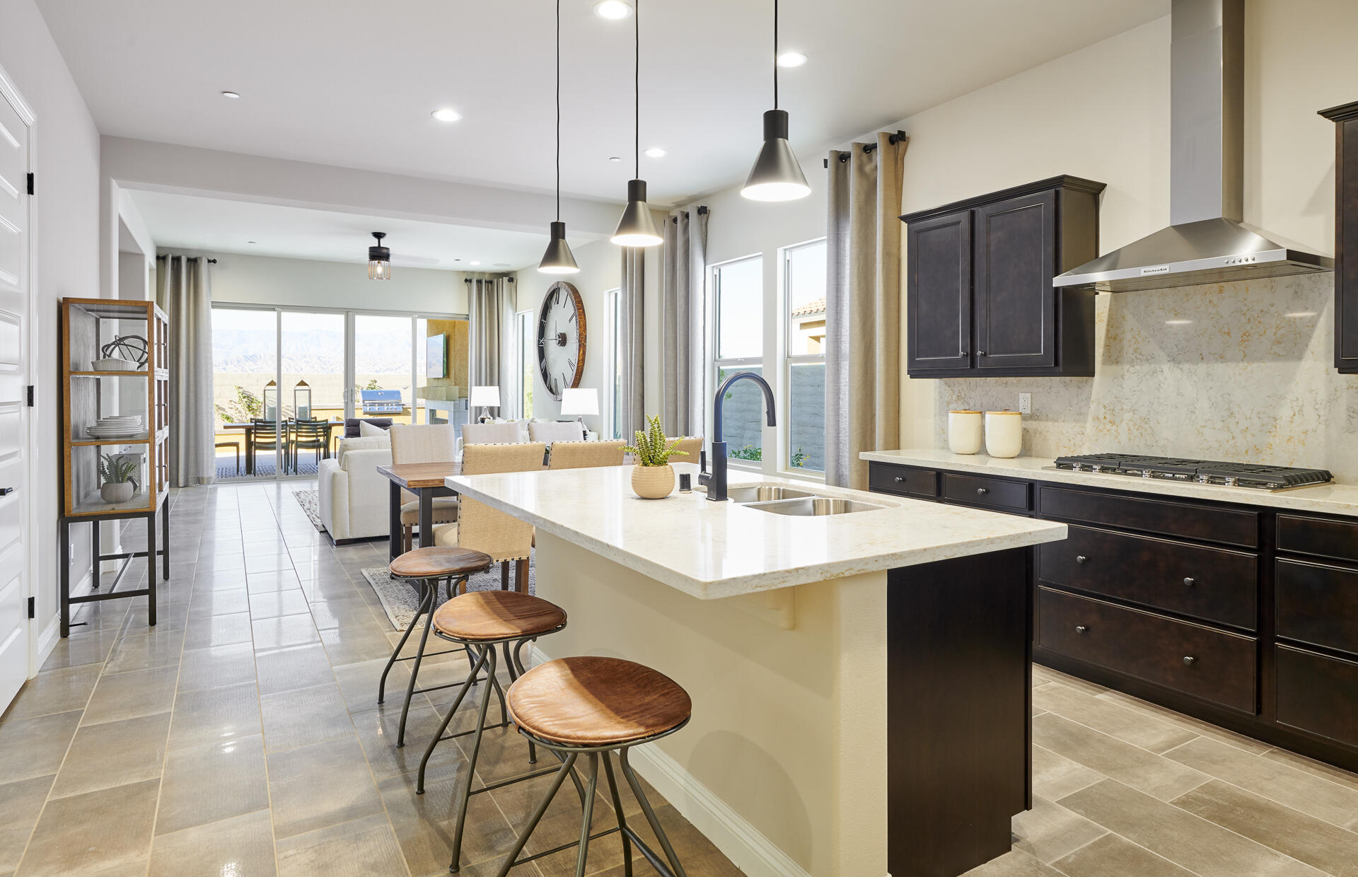 26 Zinfandel Rancho Mirage, CA 92270 - Photo 6 of 46 a kitchen with a sink a counter top space and stainless steel appliances
