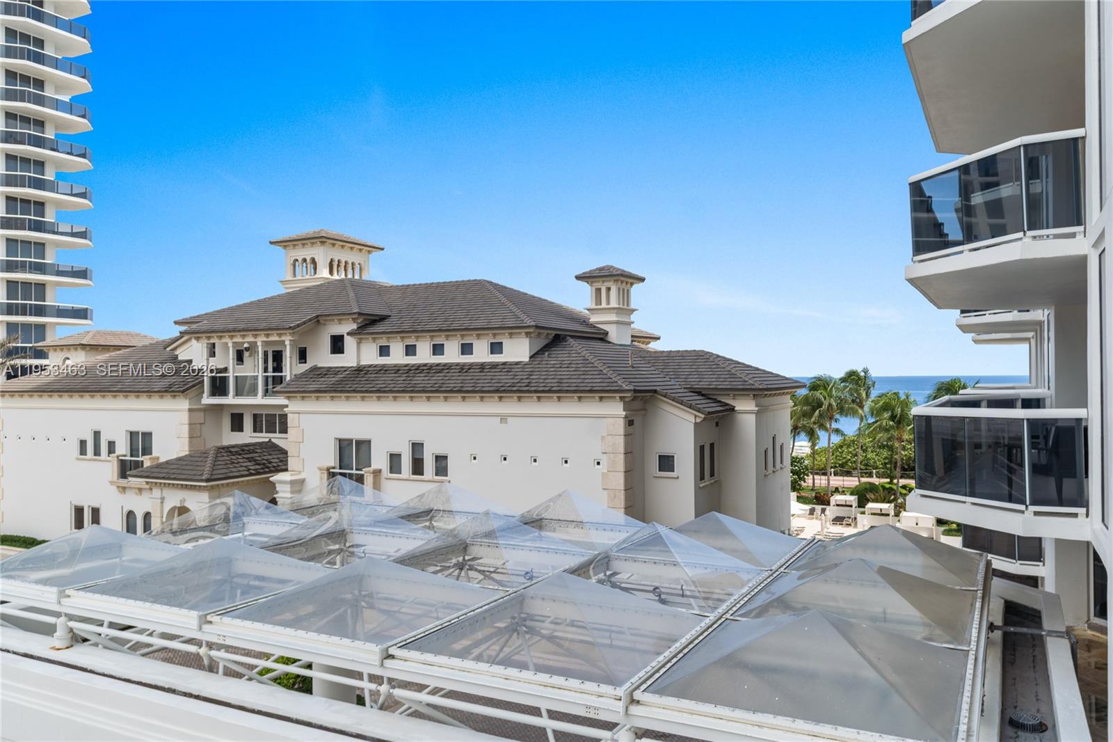 4775 Collins Avenue, Unit 507 Miami Beach, FL 33140 - Photo 13 of 51 a view of a white house with a sink and porch