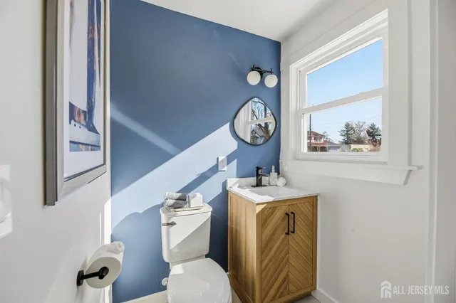 a view of a hallway with washer and dryer