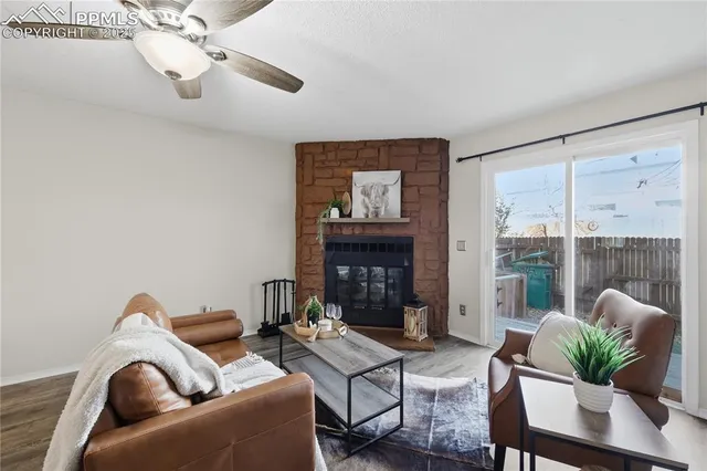 a kitchen with stainless steel appliances granite countertop a sink stove and microwave