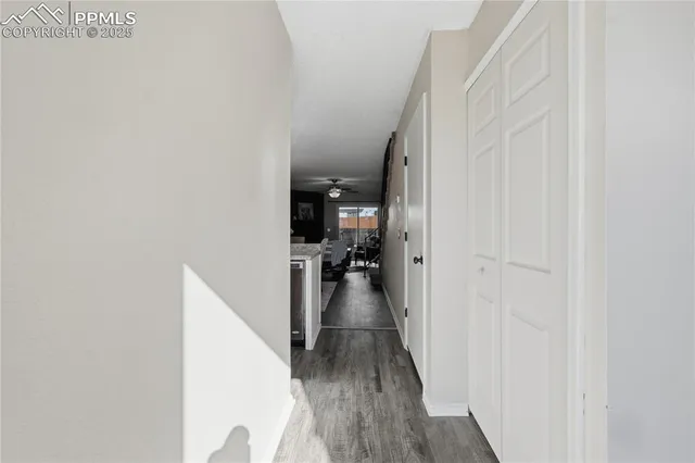 a spacious bedroom with a bed and a couch