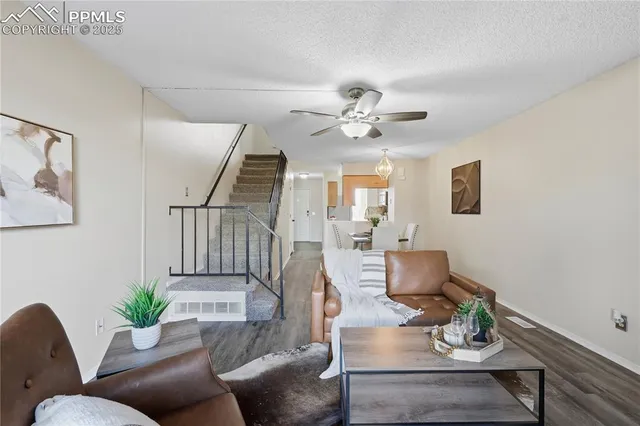 a bedroom with a bed and chair