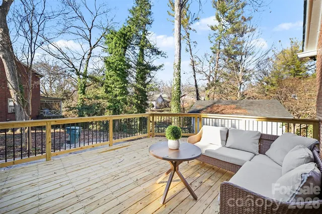 a view of a chairs on wooden deck
