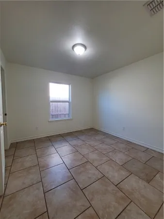 a view of a house with backyard and porch