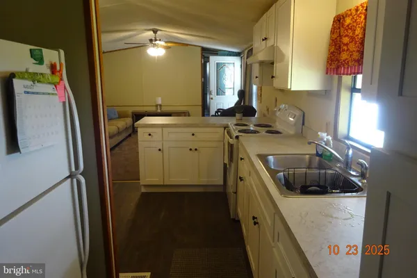 a bathroom with a sink a vanity and a mirror