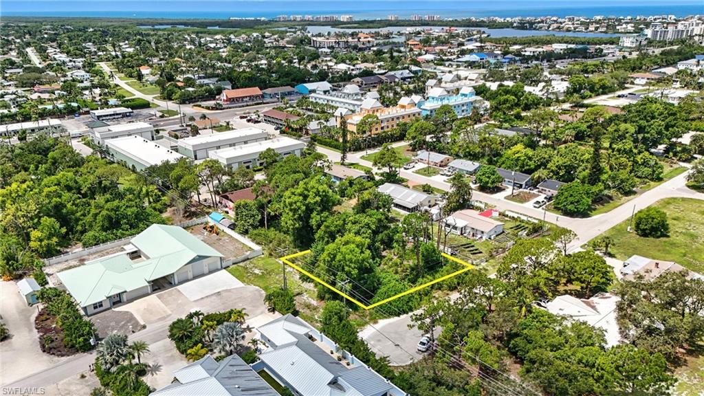 4295 Pine Lake Road Bonita Springs, FL 34134 - Photo 12 of 16 an aerial view of residential houses with outdoor space