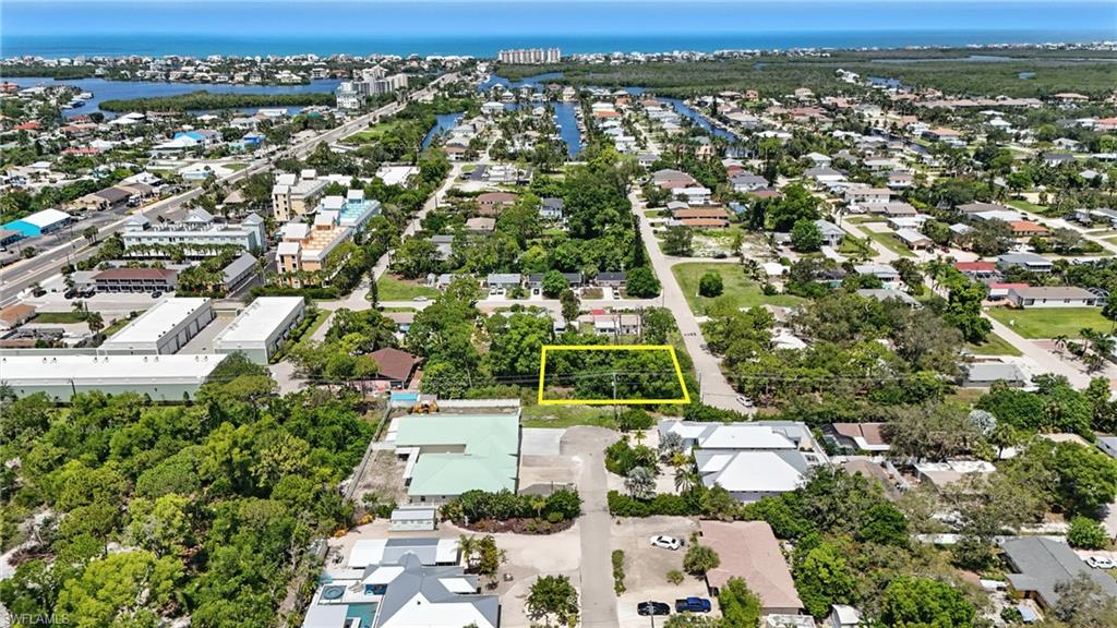 4295 Pine Lake Road Bonita Springs, FL 34134 - Photo 2 of 16 an aerial view of residential houses with outdoor space
