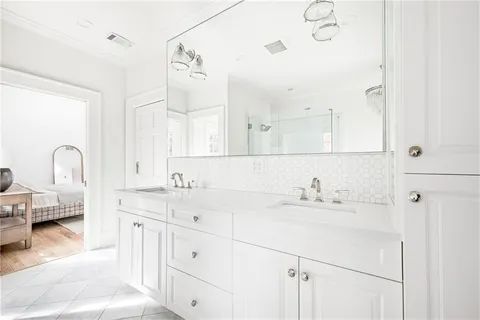 a bathroom with a bathtub and shower