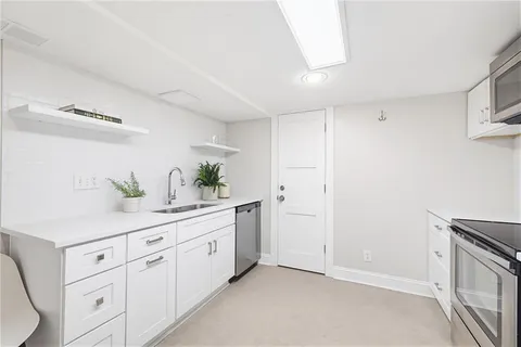 a bathroom with a sink and tub