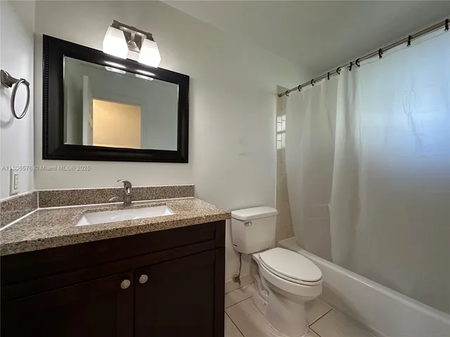 a view of a swimming pool with a garden