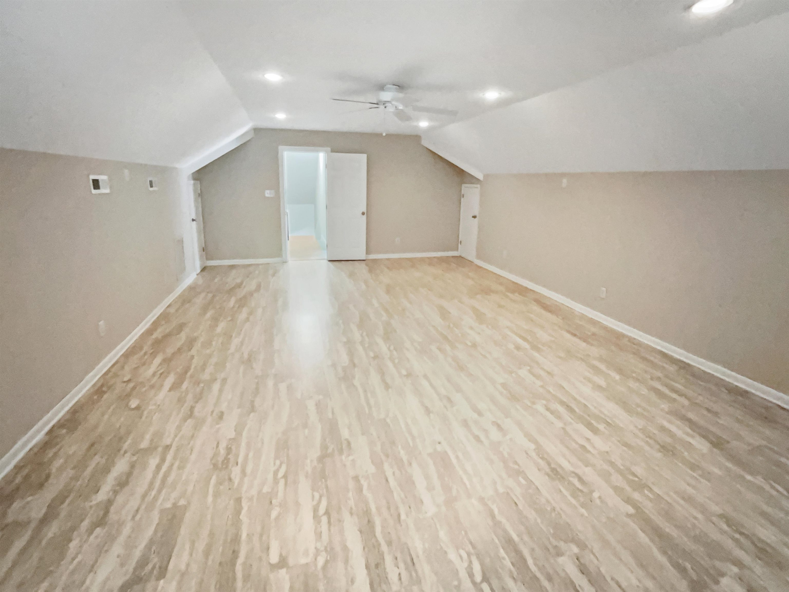 8401 Wolverton Fields Drive Wake Forest, NC 27587 - Photo 14 of 19 a view of an empty room with wooden floor