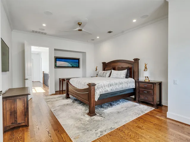 a white bath tub sitting next to a shower