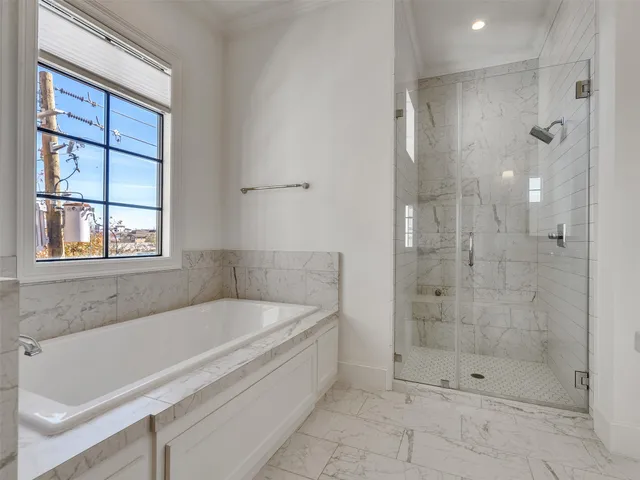 a spacious bathroom with double vanity sink and a mirror