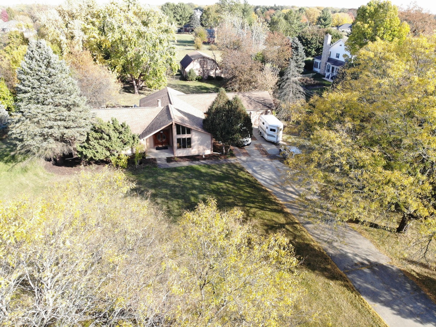 5N837 Dunham Trails Road Wayne, IL 60184 - Photo 3 of 23 a view of a house with a yard
