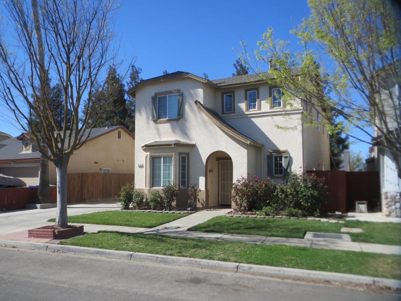 4125 Pathway Lane Turlock, CA 95382 - Photo 1 of 15 a front view of a house with a yard
