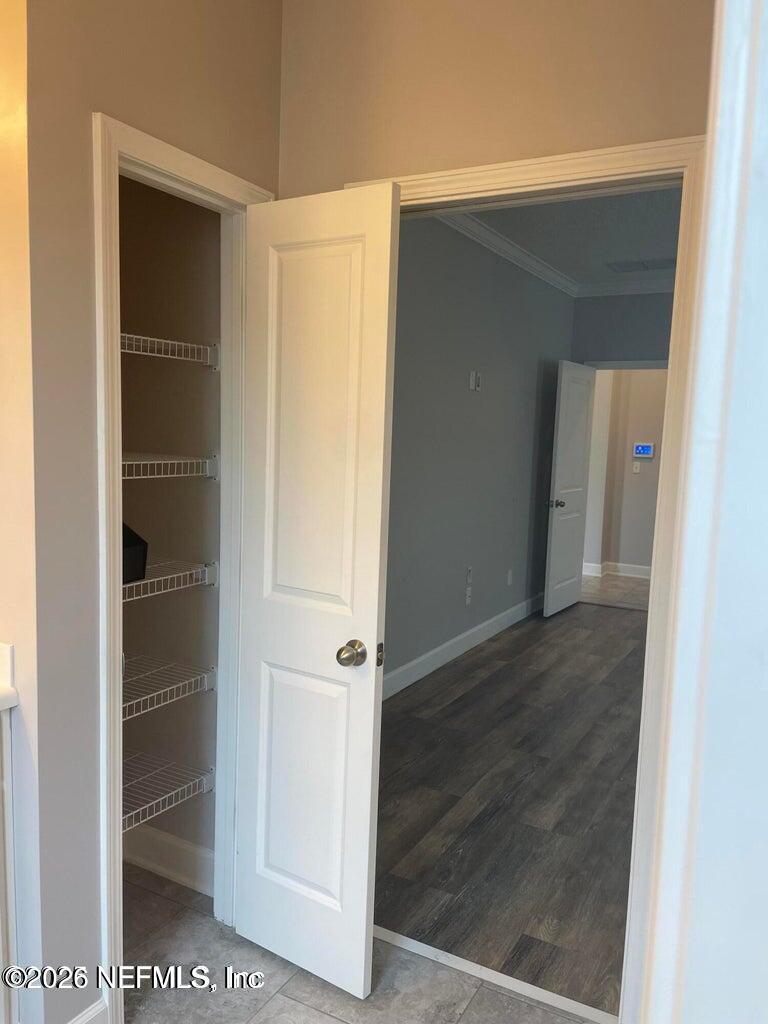 142 Jackrabbit Trail Ponte Vedra, FL 32081 - Photo 27 of 77 a view of walk in closet with empty racks