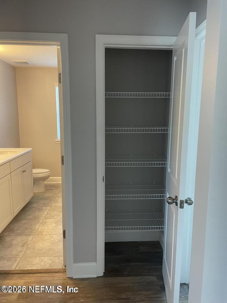 142 Jackrabbit Trail Ponte Vedra, FL 32081 - Photo 41 of 77 a view of a bathroom with a toilet