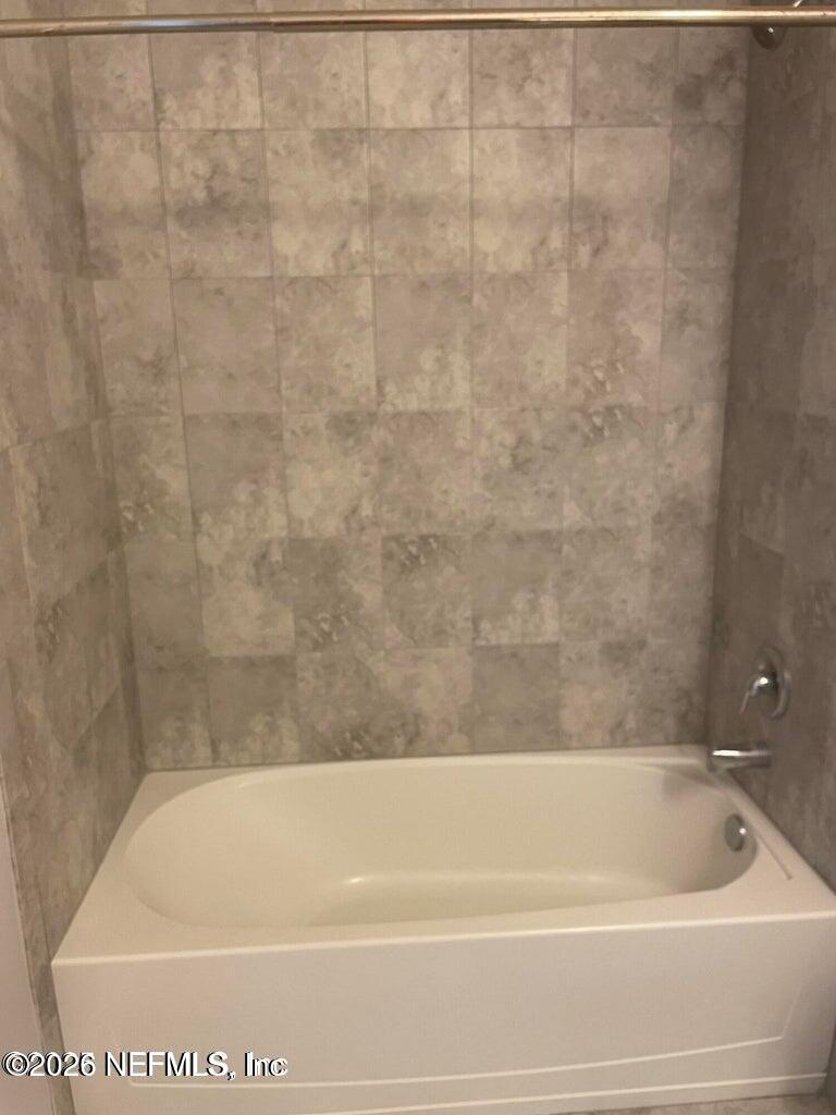 142 Jackrabbit Trail Ponte Vedra, FL 32081 - Photo 44 of 77 a bathroom with a bath tub