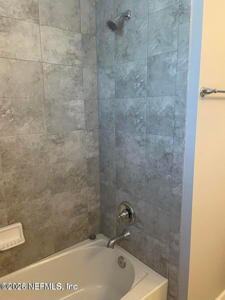 142 Jackrabbit Trail Ponte Vedra, FL 32081 - Photo 45 of 77 a bath tub sitting next to a white sink