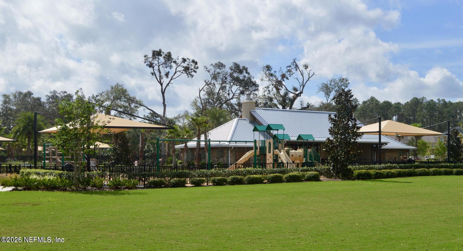 142 Jackrabbit Trail Ponte Vedra, FL 32081 - Photo 53 of 77 a front view of a house with a garden