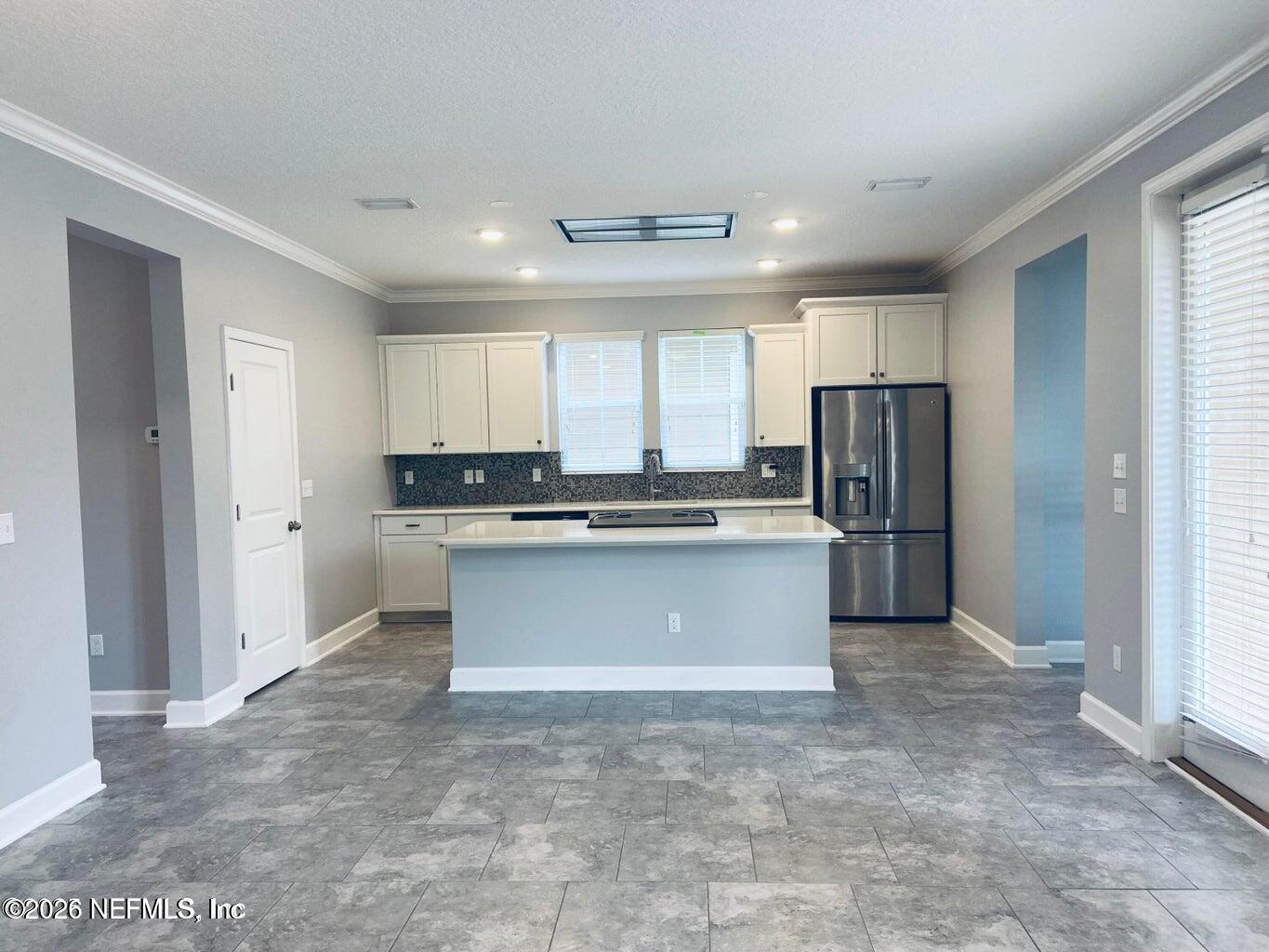 142 Jackrabbit Trail Ponte Vedra, FL 32081 - Photo 8 of 77 a large kitchen with cabinets and stainless steel appliances