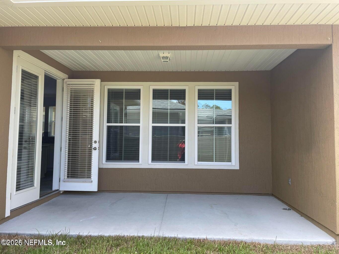 142 Jackrabbit Trail Ponte Vedra, FL 32081 - Photo 10 of 77 a view of an empty room with a window