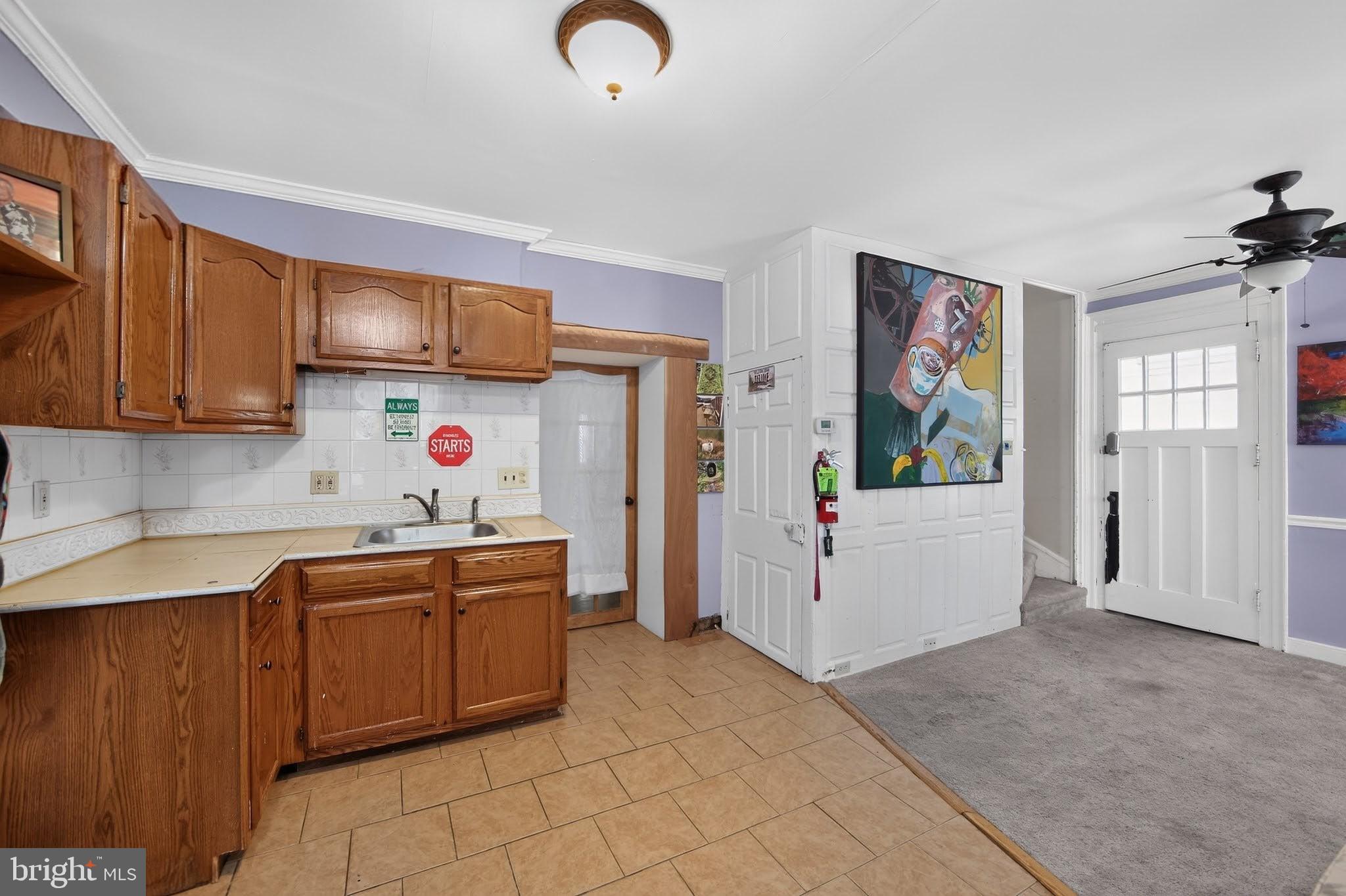 238 Brown Street Spring City, PA 19475 - Photo 32 of 57 Charming kitchen with vibrant art.