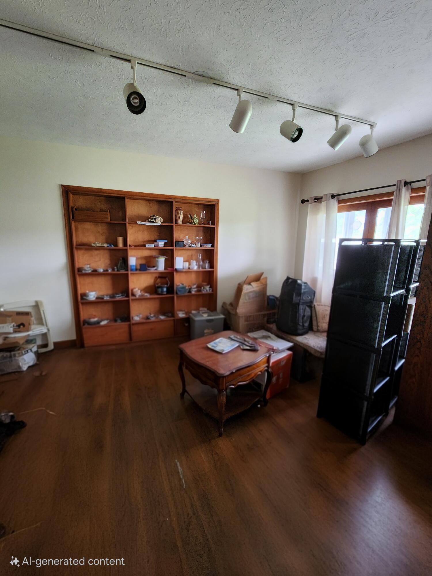 2727 Bacom Point Road Pahokee, FL 33476 - Photo 16 of 34 a living room with furniture and a window